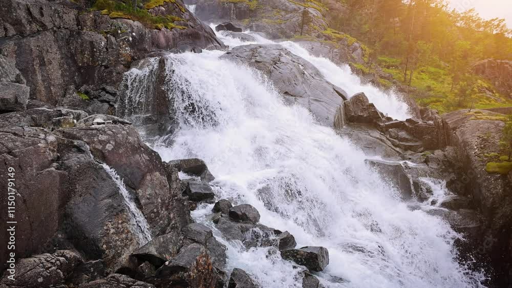 Aerial shot of Langfossen waterfall in Norway Aerial shot of Langfossen waterfall in Norway