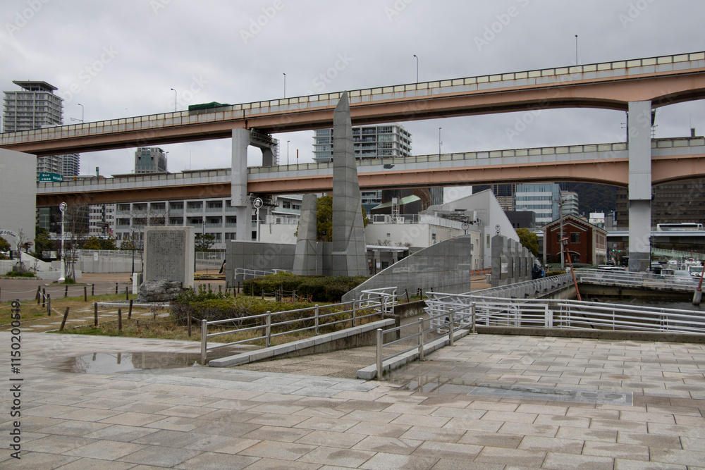 Kobe, Japan -March 6, 2024: cityscape carbridge, tsunami memorial and buildings Kobe, Japan -March 6, 2024: cityscape carbridge, tsunami memorial and buildings