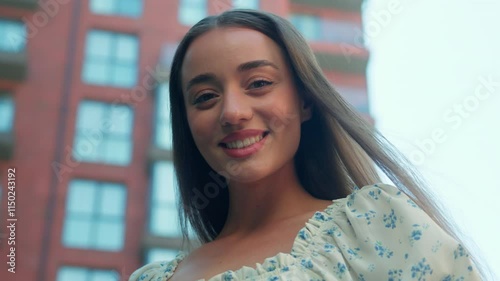 Glad Caucasian beautiful laughing woman happy female in dress smiling girl lady looking at camera wide smile portrait satisfied model gen z enjoy weekend holidays posing outdoors city street downtown