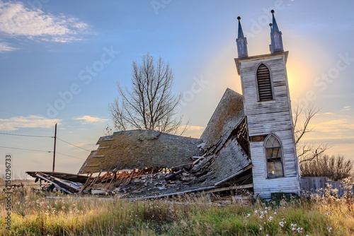 A church has been destroyed and is now a pile of rubble photo