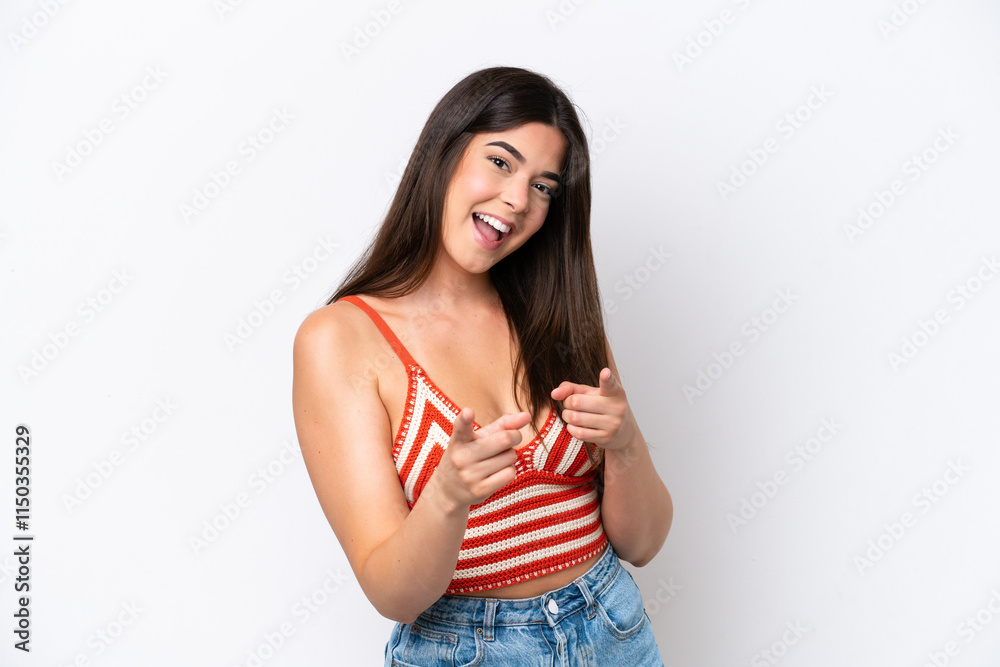 Young Brazilian woman isolated on white background surprised and pointing front