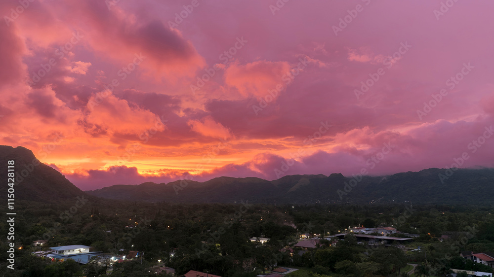 Obraz premium Aerial view of the small village of Anton Valley Panama at sunset with a beautiful and colorful sky.