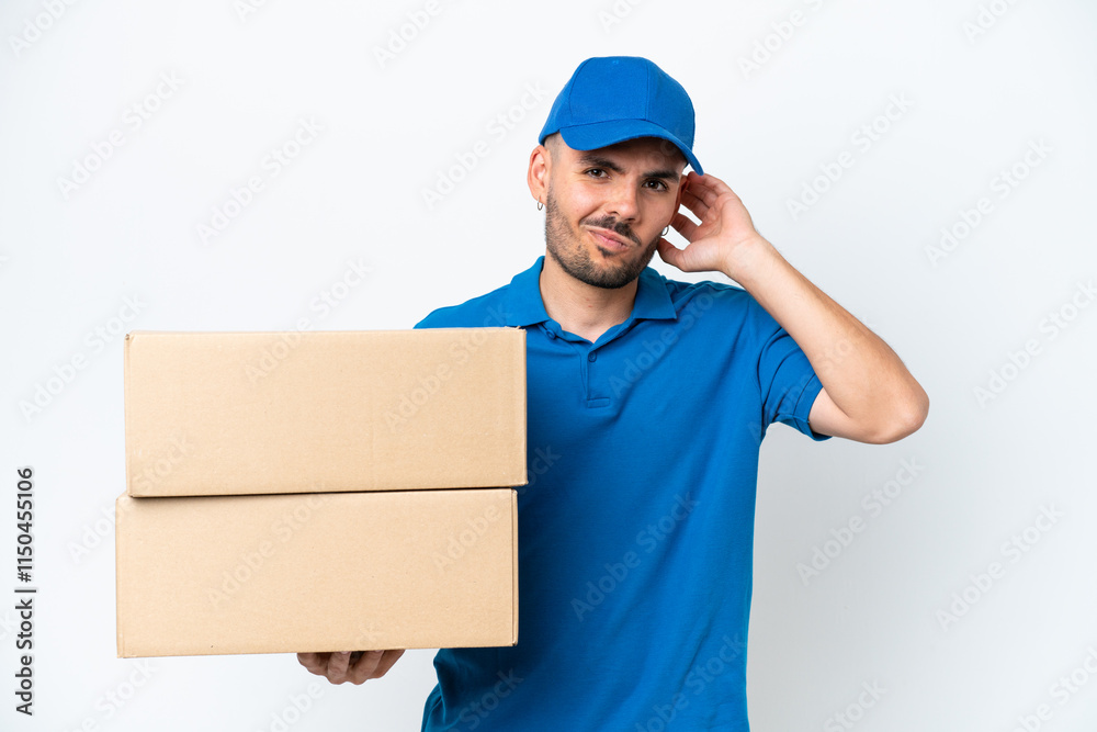Delivery caucasian man isolated on white background having doubts Delivery caucasian man isolated on white background having doubts