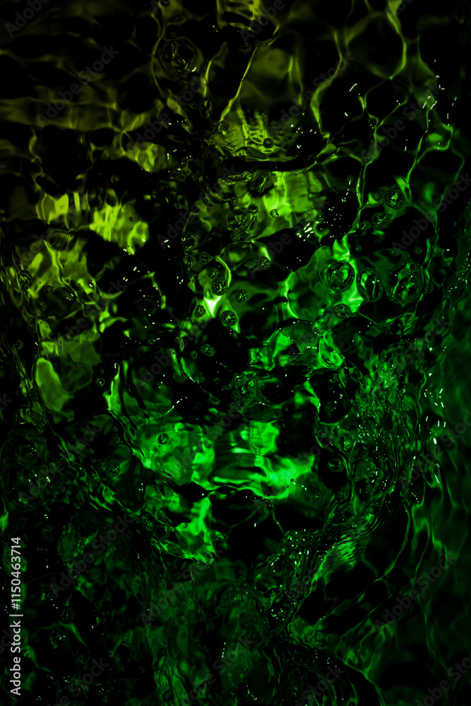 Obraz premium Abstract green water texture with bubbles creating a mesmerizing natural pattern.