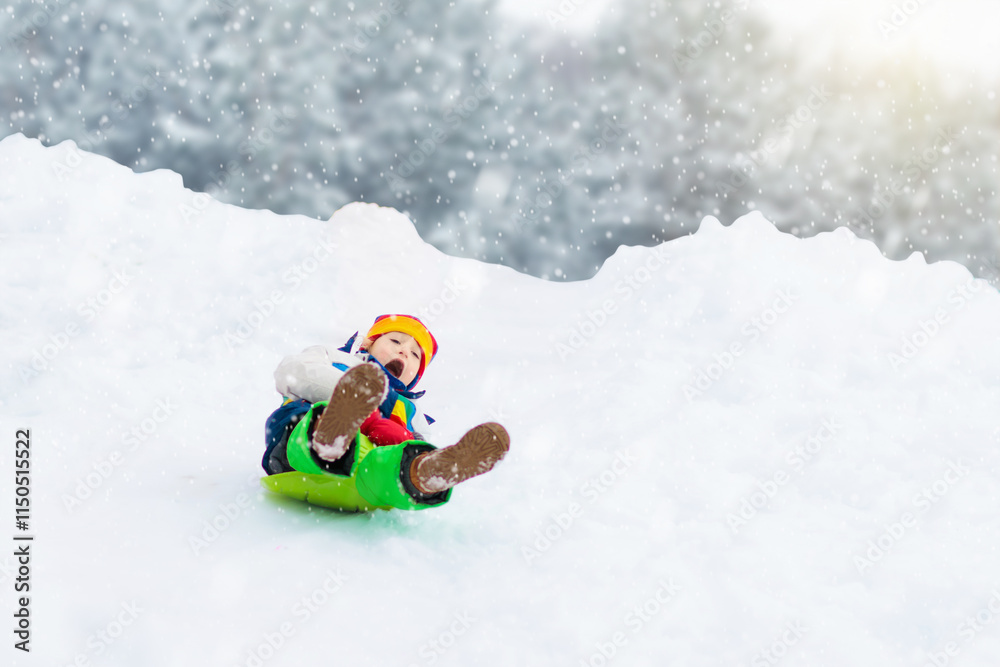Girl on sled ride. Child sledding. Kid on sledge Girl on sled ride. Child sledding. Kid on sledge