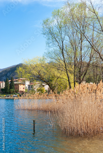 The lakeside of Lavena Ponte Tresa offers scenic views of Lake Lugano, with peaceful walking paths, lush greenery, and charming spots to relax, perfect for nature lovers and outdoor enthusiasts. photo