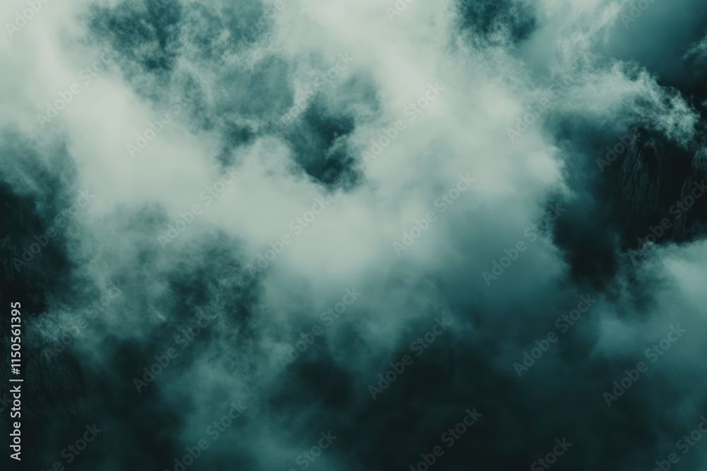 Dark Teal Clouds Enveloping Mountain Peaks Dark Teal Clouds Enveloping Mountain Peaks