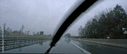 POV: Driving on German Autobahn on a rainy day in winter 