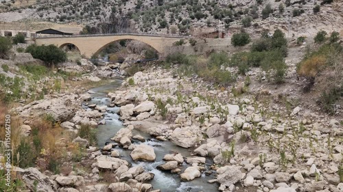 The Cakit Bridge over the Cakit River (Çakıtsuyu) at the southern end of Kapikaya Canyon in Karaisali district of Adana province in Turkey. photo