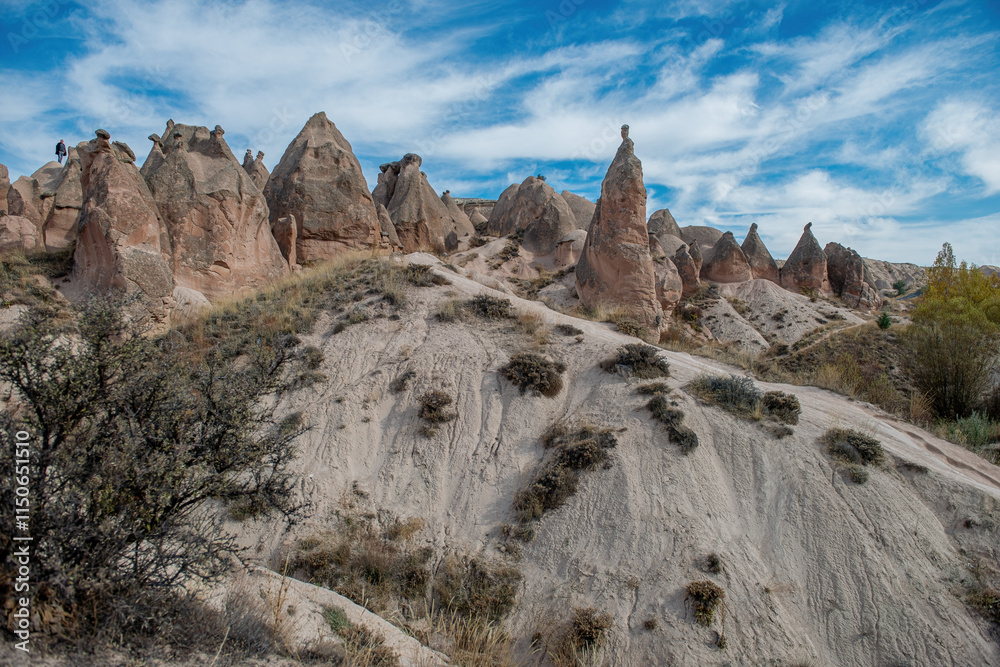 Fairy Chimneys are world-famous natural formations located in the Cappadocia region of Turkey. They were formed by the wind and water erosion of volcanic tuff layers over thousands of years.