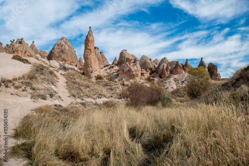 Fairy Chimneys are world-famous natural formations located in the Cappadocia region of Turkey. They were formed by the wind and water erosion of volcanic tuff layers over thousands of years.