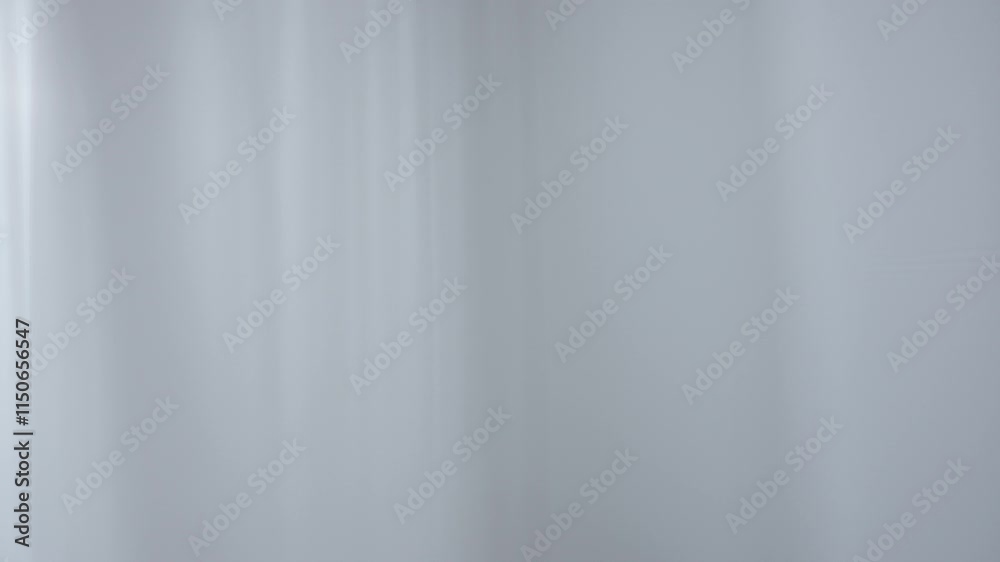 Transparent white silk soft fabrics floating with light shining through, shades shadows of window silhouette reflected on the textile, full shot. Transparent white silk soft fabrics floating with light shining through, shades shadows of window silhouette reflected on the textile, full shot.