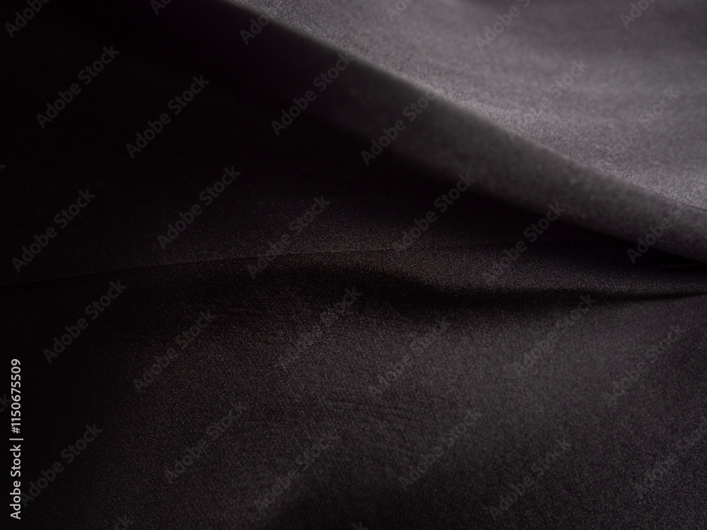 Obraz premium Close-up of black silk fabric. Background, texture