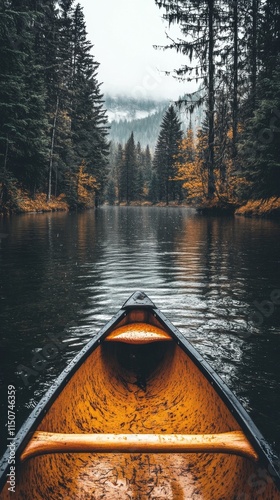 Canoeing on a peaceful lake surrounded by autumn trees under a cloudy sky