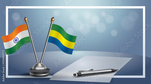 India and Gabon National flags on small table with bokeh background, cooperative relationship