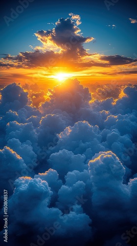 Aerial view of sunset over fluffy clouds.