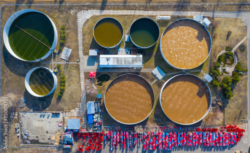 Water Treatment Plant with Round Tanks and Industrial Equipment, Beverage Factory Infrastructure, Top Down Aerial View of Processing Facility