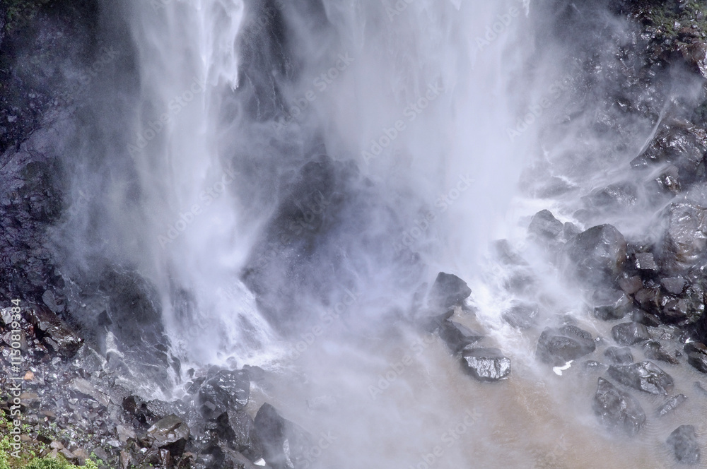 Obraz premium Caracol Falls, a 130 meters waterfall, formed by the Caracol River and cuts out of basalt cliffs in the mountain range, one of most popular natural tourist attraction in Brazil, RS, Canela, 2016
