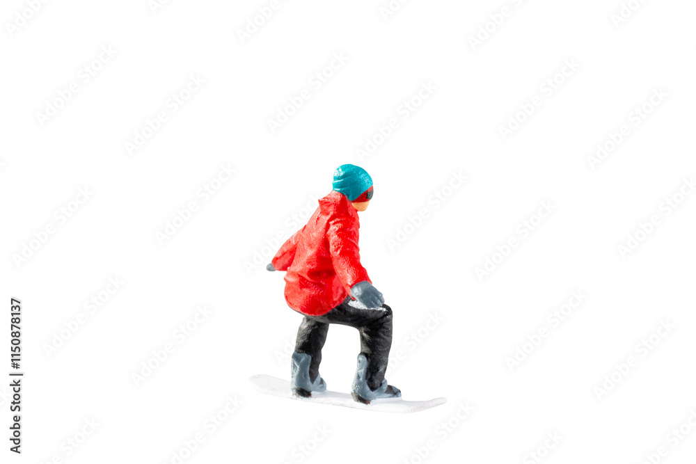 Miniature figurine depicting a snowboarder in mid-motion isolate on white background with clipping path Miniature figurine depicting a snowboarder in mid-motion isolate on white background with clipping path