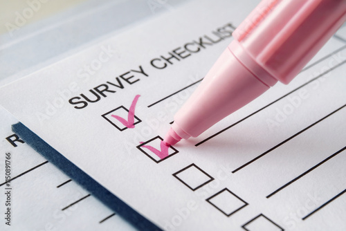 Pink Marker Checking Off Survey Checklist
