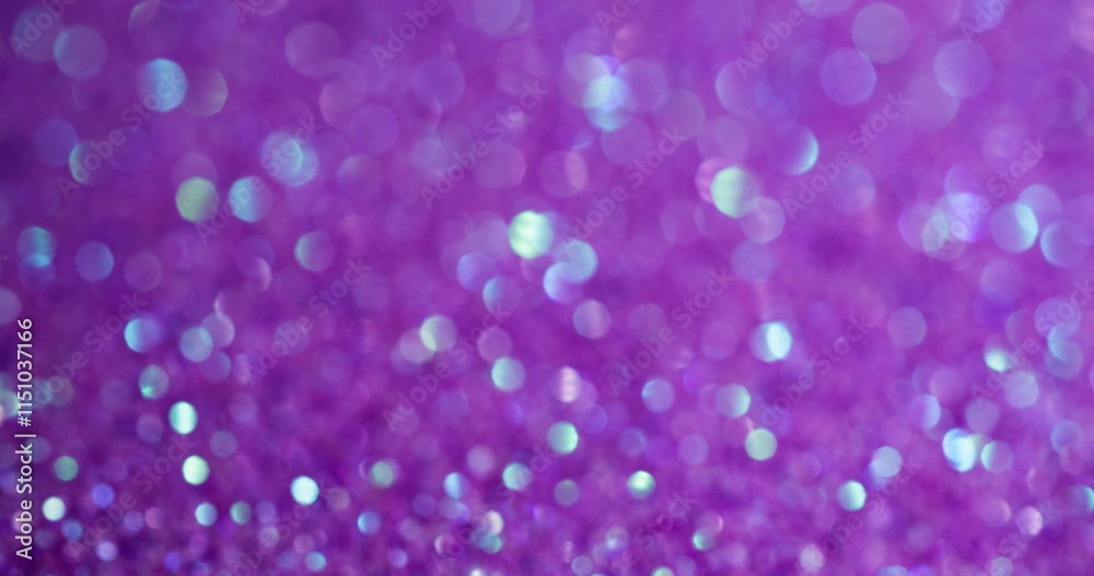 Blurred confetti. Purple sparkling. Small light flare spots of shining dust on lilac background. Changing violet glitter fairy luminosity. Blurred confetti. Purple sparkling. Small light flare spots of shining dust on lilac background. Changing violet glitter fairy luminosity.