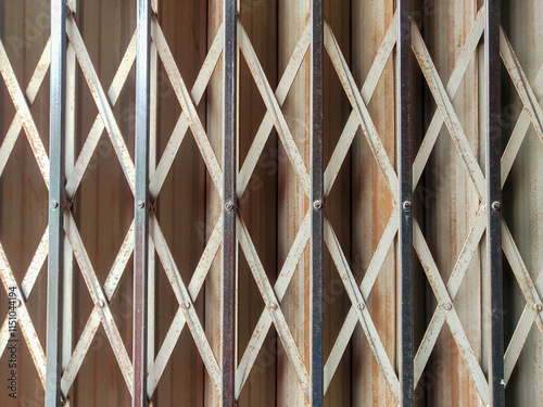 Background of the reinforcement of the folding gate which has started to rust