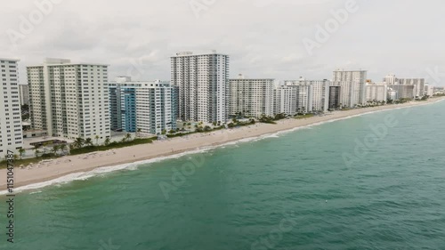 Fort Lauderdale Florida drone of expensive apartment buildings right on the water overlooking the sea and beach photo