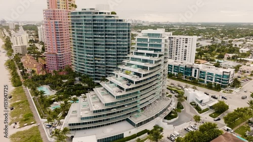 Fort Lauderdale Florida drone of luxury skyscrapers overlooking the ocean, beach, and expensive homes photo