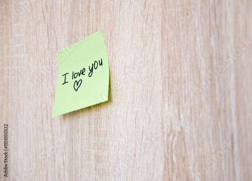 A sticker with the inscription I love you is glued to the surface. There is space for text.