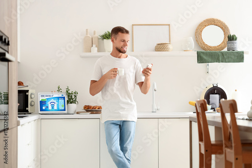 Young man with coffee cup u...