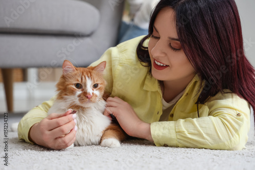 Young woman with cute cat l...