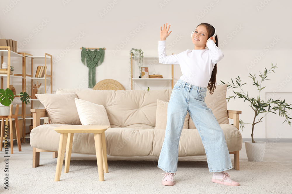 Teenage girl in headphones dancing at home Teenage girl in headphones dancing at home