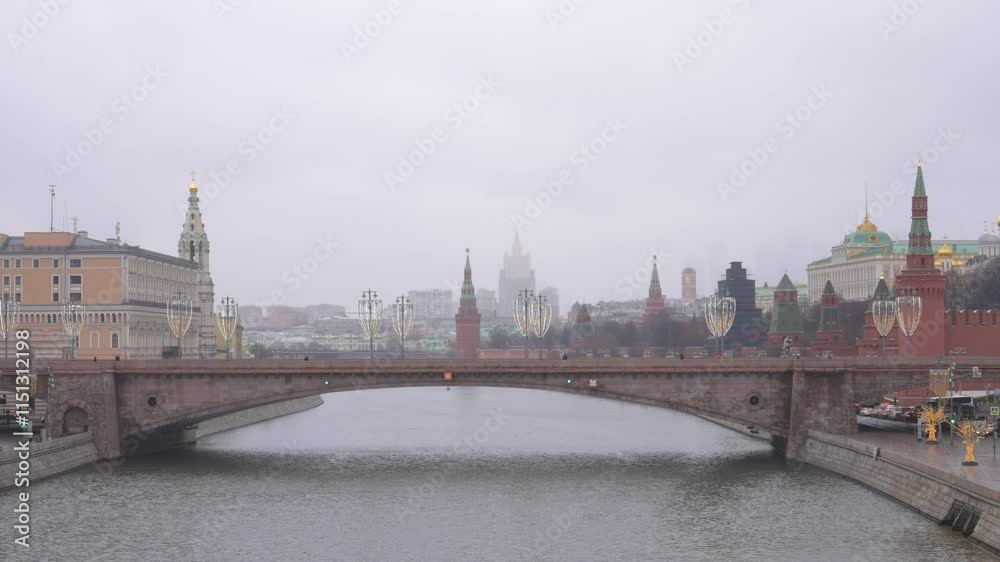 Famous Moscow Cityscape on a cloudy day with the Moskva River and the Kremlin fortress, a historic symbol of Russia Famous Moscow Cityscape on a cloudy day with the Moskva River and the Kremlin fortress, a historic symbol of Russia