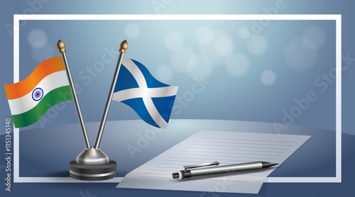 India and Scotland National flags on small table with bokeh background, cooperative relationship
