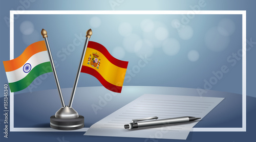 India and Spain National flags on small table with bokeh background, cooperative relationship