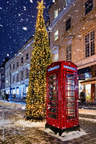 Photography Christmas in London scene with a classic, red telephone booth in front of a deco