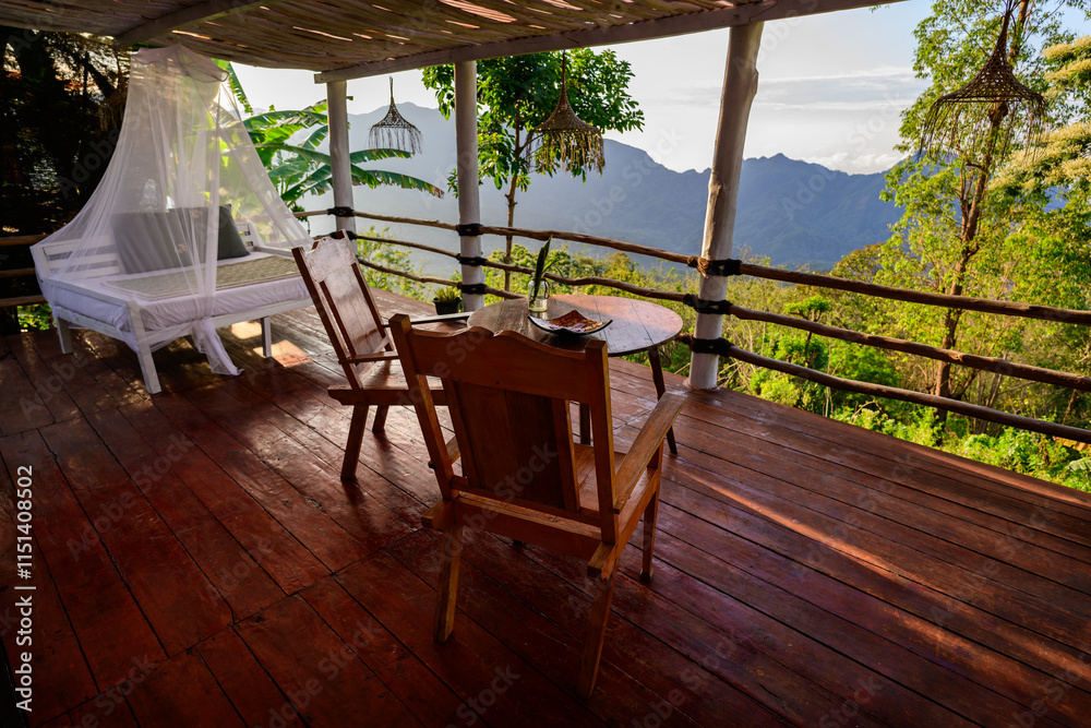 Porch or Verandah overlooking the Lush Jungle Forest in Bajawa, Flores, Indonesia Porch or Verandah overlooking the Lush Jungle Forest in Bajawa, Flores, Indonesia