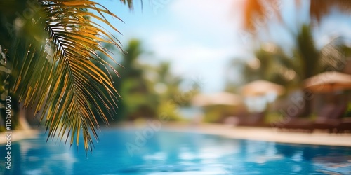 Fototapeta Naklejka Na Ścianę i Meble -  Blurred summer background featuring a resort hotel ideal for relaxation, including a swimming pool or beach party ambiance with a blue sky and tropical palm trees. Perfect for summer vibes.