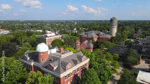 Sherzer Observatory in Eastern Michigan University, in Ypsilanti, Michigan, USA and the historic Ypsilanti Water Tower in the background photo