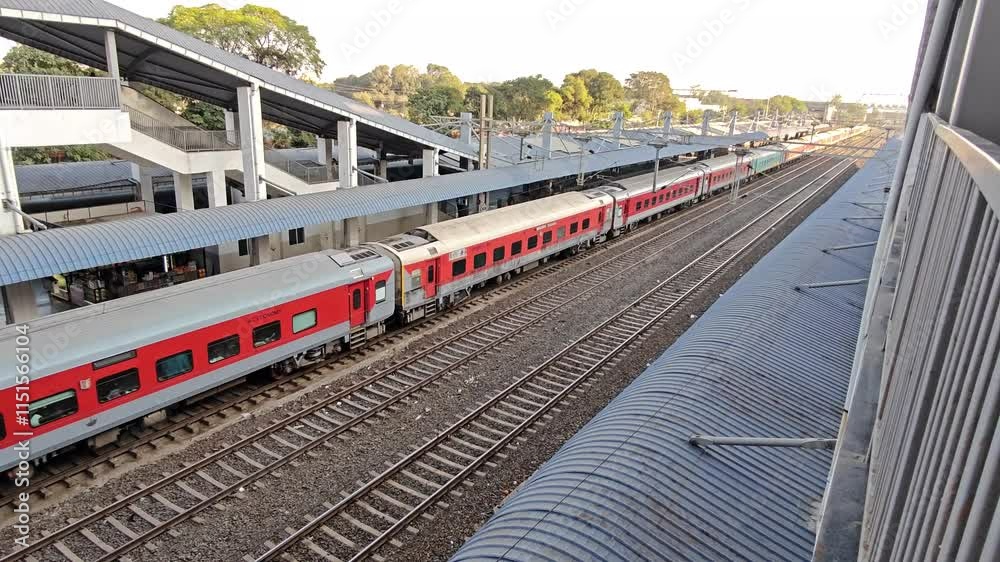 Passenger train moving through station in Bhopal Passenger train moving through station in Bhopal