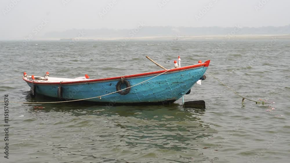 Ganges River Boat Ride and Manikarnika Ghat on the banks of River Ganges in Varanasi, India. Ganges River Boat Ride and Manikarnika Ghat on the banks of River Ganges in Varanasi, India.