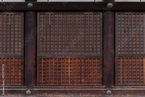 Japanese wooden shrine temple wall panel grid style old ancient texture pattern for background