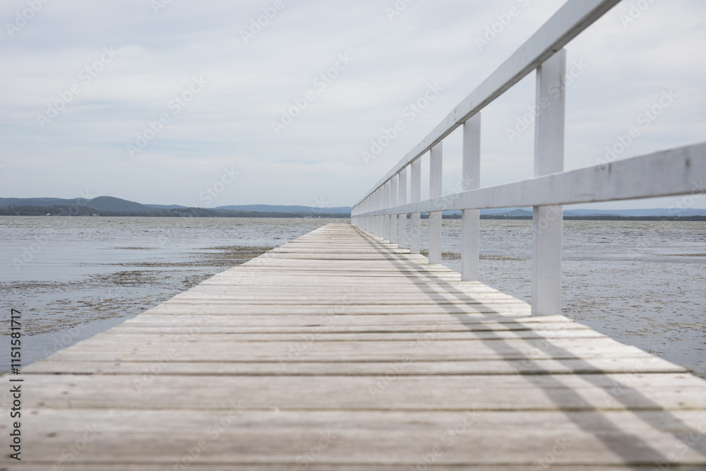 Fototapeta premium calm lake water pontoon jetty pontoon long sail row