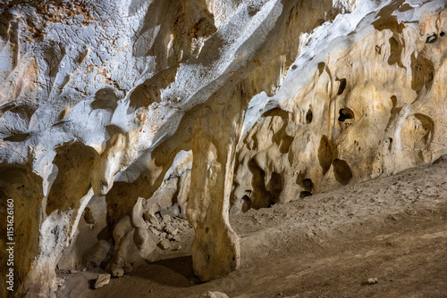 Interior of the large hall of old Karain cave, hidden in Mediterranean region. Confirms human habitation since the early Paleolithic age between 150,000 and 200,000 years ago.Yagca, Antalya, Turkey. photo