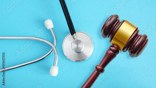 Medical Law and Ethics are shown with stethoscope and gavel. Healthcare legislation and regulation, medical malpractice decision and health care injury personal attorney photo