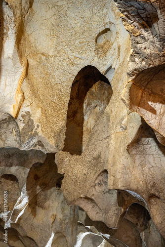 Interior of the large hall of old Karain cave, hidden in Mediterranean region. Confirms human habitation since the early Paleolithic age between 150,000 and 200,000 years ago.Yagca, Antalya, Turkey. photo