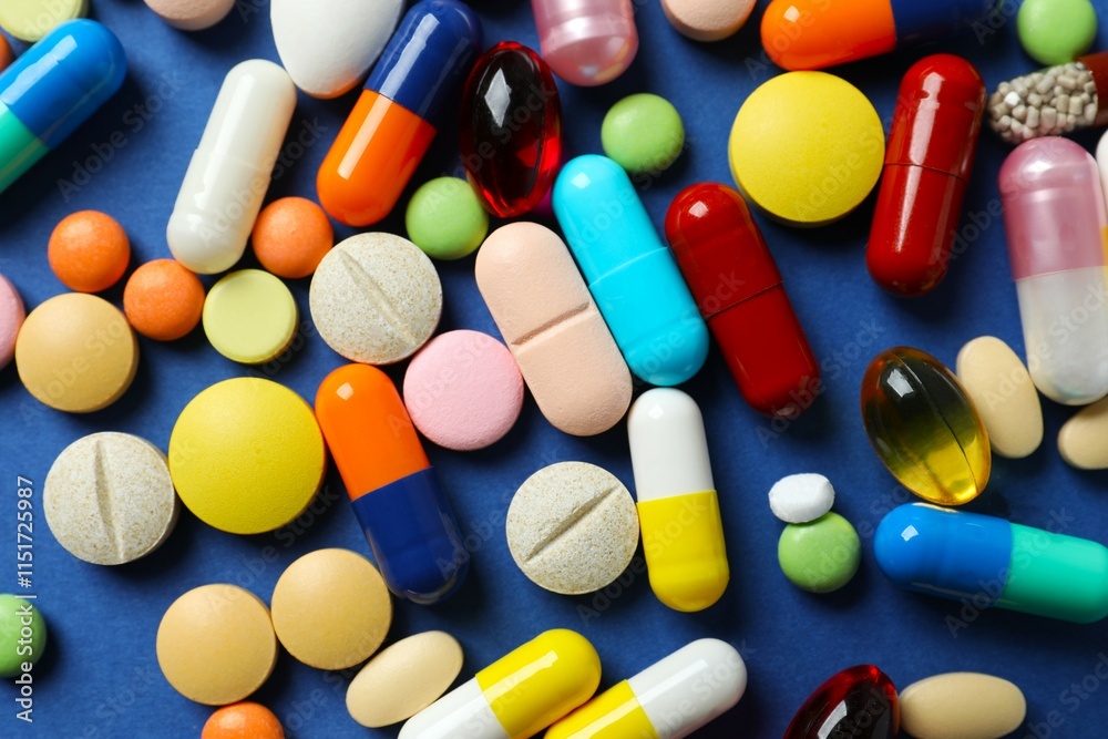 Various pills on a colored background