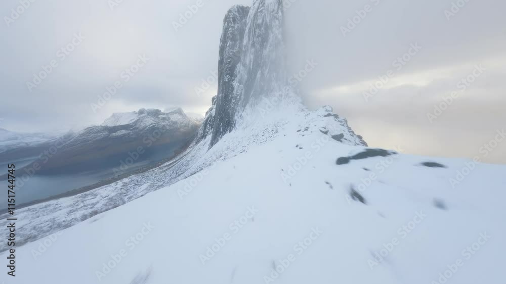 FPV Drone Flying Along Cliff Towards Segla, Senja, Norway