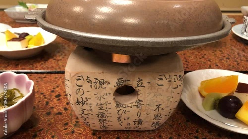 A set of lime-based cooking utensils used in a Japanese culinary specialty restaurant, showcasing traditional craftsmanship. photo