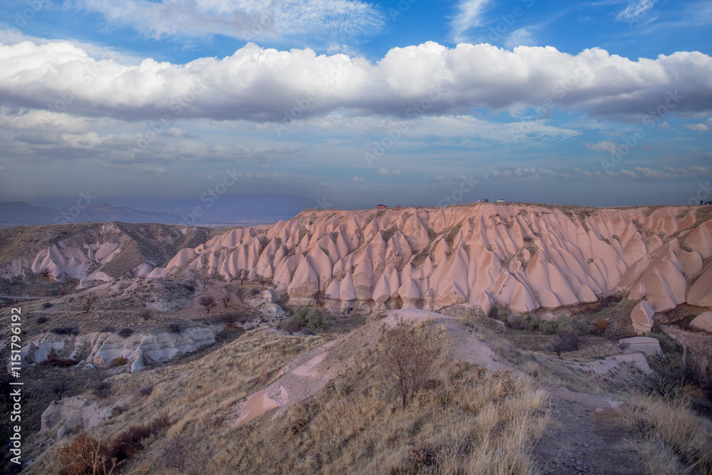 Fairy Chimneys are world-famous natural formations located in the Cappadocia region of Turkey. They were formed by wind and water erosion of volcanic tuff layers over thousands of years.
